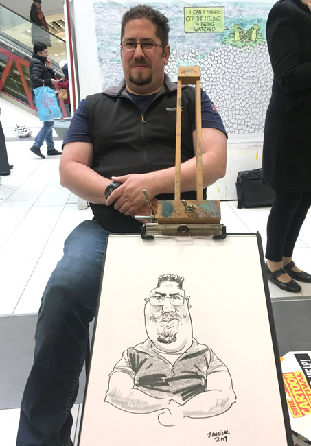 Caricature drawing of visitor at an event in Shrewsbury, Shropshire